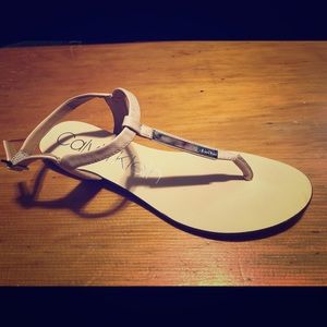 Nude t-strap Calvin Klein flat sandals
